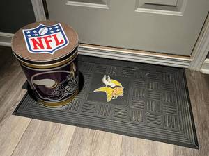 lot 27 image: Minnesota Vikings Rubber Door Mat and Tin Canister