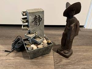 lot 58 image: Home Decor - Electric Zen Water Feature and Wood Carved Figurine