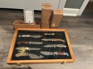 lot 131 image: North American Hunting Club Knife Collection - Framed Set of 8 Knives