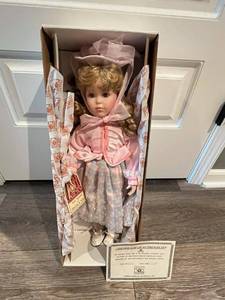lot 145 image: Vintage Dynasty Collection Simone Porcelain Doll