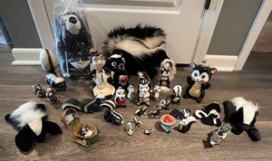 lot 172 image: Fabulous Skunk Figurine Collection featuring Kreiss & Company