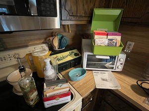 lot 264 image: Kitchen Starter Lot - Black & Decker Toast-R-Oven Classic, Utensils, Recipes, and More