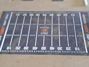 lot 785 image: Titos Handmade Vodka Football Field theme Floor Mat