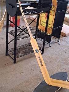 lot 751 image: Captain Morgan - Minnesota Wild Hockey Stick