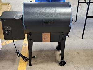 lot 746 image: Traeger Tailgater Pellet Grill Titos Handmade Vodka Grill