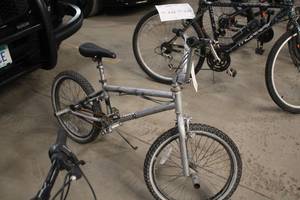 lot 812 image: Mongoose 16 Boys BMX Trick Bike 12 Silver Frame