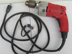 lot 52 image: Milwauke Magnum 12 Inch Corded Drill