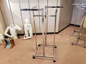 lot 38 image: Lot of 3 Adjustable Height 4 Way Racks on Wheels