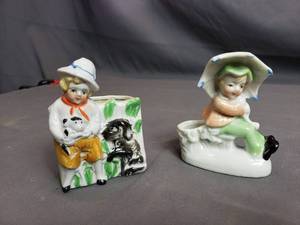lot 20 image: Small Boy and Girl Planters