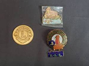 lot 86 image: Lions Pins and Coin