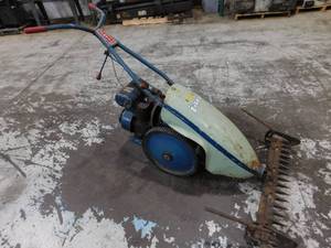 lot 23 image: Jari Monarch 4 HP Brush Cutter