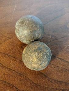 Two Antique Cannonballs