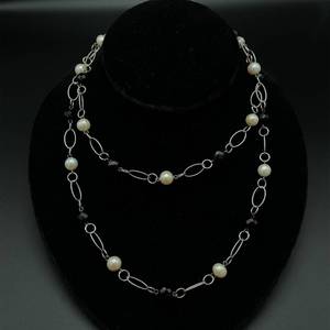 Shimmering White Pearl and Onyx Single-Strand Layering Necklace - Measures 36 Long