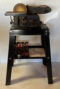 lot 1 image: Craftsman 4 x 36 Belt 6 Disc BeltDisc Sander With Stand, Extra Belts And Manual