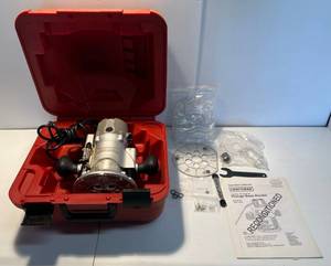lot 27 image: Craftsman 9.5 Amp 1 34 Peak HP Plunge Base Router With Case, Manual And Extras