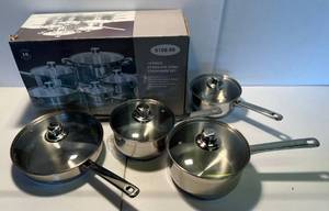 lot 51 image: Eight Piece Stainless Steel Cookware Set NIB
