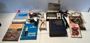 lot 115 image: Vintage Automotive Repair Manuals, Sears Engine Analizer With Manual, Vintage Inductive Timing Gun, Spark Plug Gapper And More