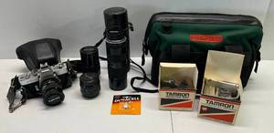 lot 194 image: Minolta SRT 201 Camera With Extra Lens And More