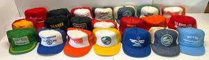 lot 198 image: 21 Vintage Used Snapback Hats With Misc. Advertisement (Slight Old Smell)