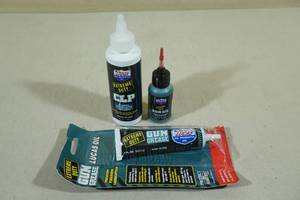 lot 35 image: Lucas Oil Extreme Duty Gun Oil, Grease, and Cleaner