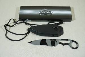 lot 56 image: Master Cutlery Stainless Blade Boot or Neck Knife