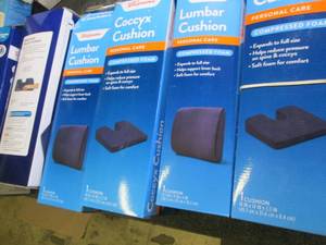 lot of coccyx cushions and lumbar c...