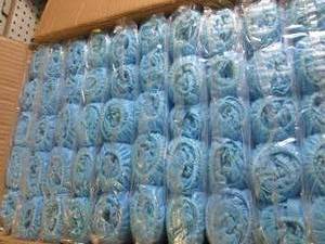 case of blue non skid shoe covers 1...