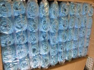 case of blue non skid shoe covers 1...