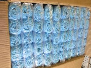 case of blue non skid shoe covers 1...