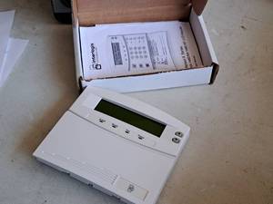 lot 19 image: Interlogix 192Z NetworX Programmable LCD Keypad Alarm System NX-148E-RF