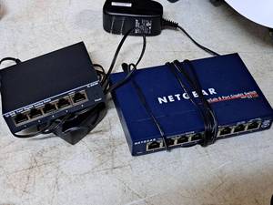 lot 220 image: Lot of (2) Computer Electronics - Netgear ProSafe 8 Port Gigabit Switch GS108, tp-link 5-Port Gigabit Desktop Switch TL-SG105