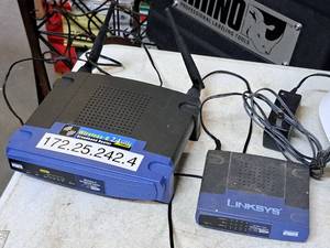 lot 219 image: Lot of (2) Cisco Linksys Computer Electronics - 10100 5-port Workgroup Switch EZXS55W, Wireless-G Broadband Router WRT54G