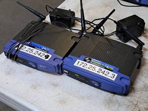 lot 217 image: Lot of (2) Linksys Routers - Wireless-G Broadband WRT54G, Wireless-B Broadband BEFW11S4
