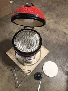 Joe Jr. 13.5 in. Portable Charcoal Grill in Red with Cast Iron Cart, Heat Deflectors and Ash Tool by Kamado Joe Damaged Customer Returns See Pictures