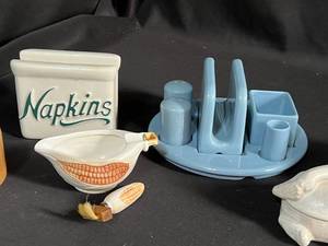 lot 100 image: Assorted Kitchen Decor Napkin Holder, Jars, Coasters & More