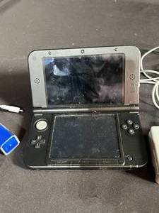 lot 123 image: Red and Black Nintendo 3DS XL, Lot 2