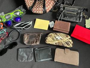lot 124 image: Lot of Sunglasses, Wallets, and More