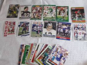 lot 6 image: 50 Assorted Football Star Cards...