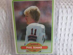 lot 7 image: 1980 Topps Phil Simms Rookie Card...