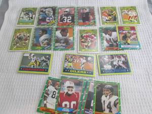 lot 147 image: Assorted 1986 Topps Football Cards...