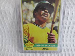lot 181 image: 1976 Topps Reggie Jackson Card...