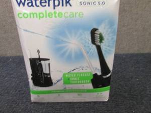 lot 398 image: Waterpik Complete Oral Care 5.0 - B...