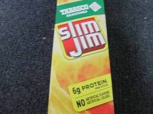 lot 229 image: Box of 24- 0.97 oz Slim Jim Tabasco...