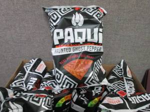 lot 258 image: 7- 7 oz Bags Paqui Haunted Ghost Pe...