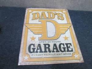 lot 284 image: Metal Garage Sign 12.5x16.5 inches...