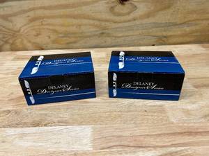 lot 44 image: DELANEY HARDWARE Lot of 2- Italian Collection Sorado Black Dummy Door Levers