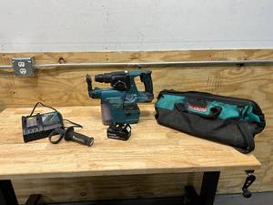 lot 103 image: MAKITA LXRH01 Hammer Drill with DX01 Hepa Filter, 5Ah Battery, Charger and Carrying Bag