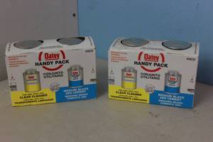 lot 144 image: NEW - 2 Packs of Oatey 8 oz. Clear PVC, CPVC, ABS All-Purpose Pipe Cleaner and Medium Black ABS Cement Combo Pack MSRP $26.80 038753302331