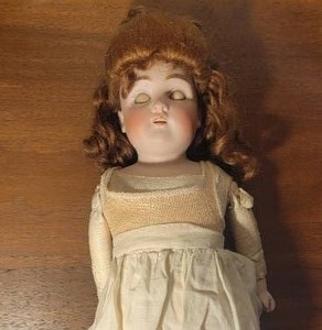 lot 24 image: Amazing Antique Ceramic Doll