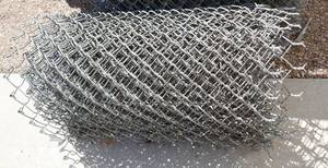 lot 12 image: Roll of fencing 4 ft high - dont know length